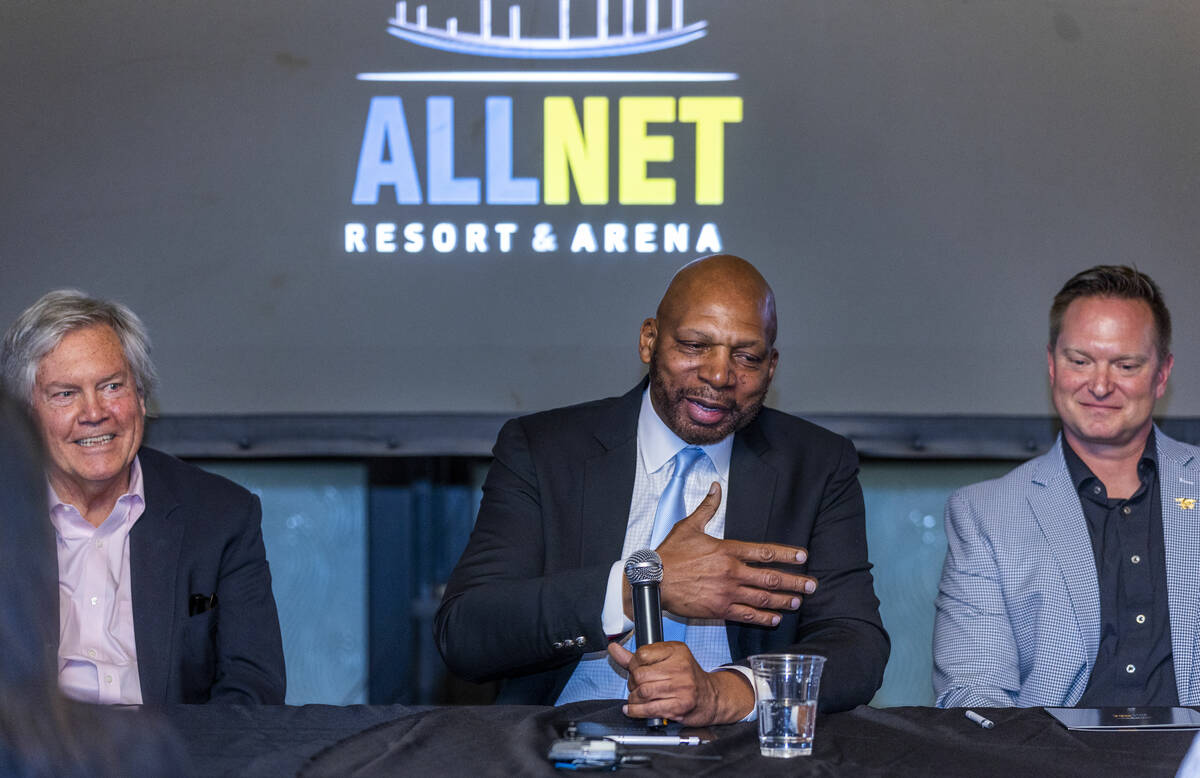 Ex-NBA player Jackie Robinson, center, holds a press conference to announce funding for his lon ...
