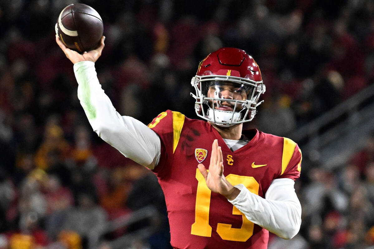 Southern California quarterback Caleb Williams throws a pass against Colorado during the first ...