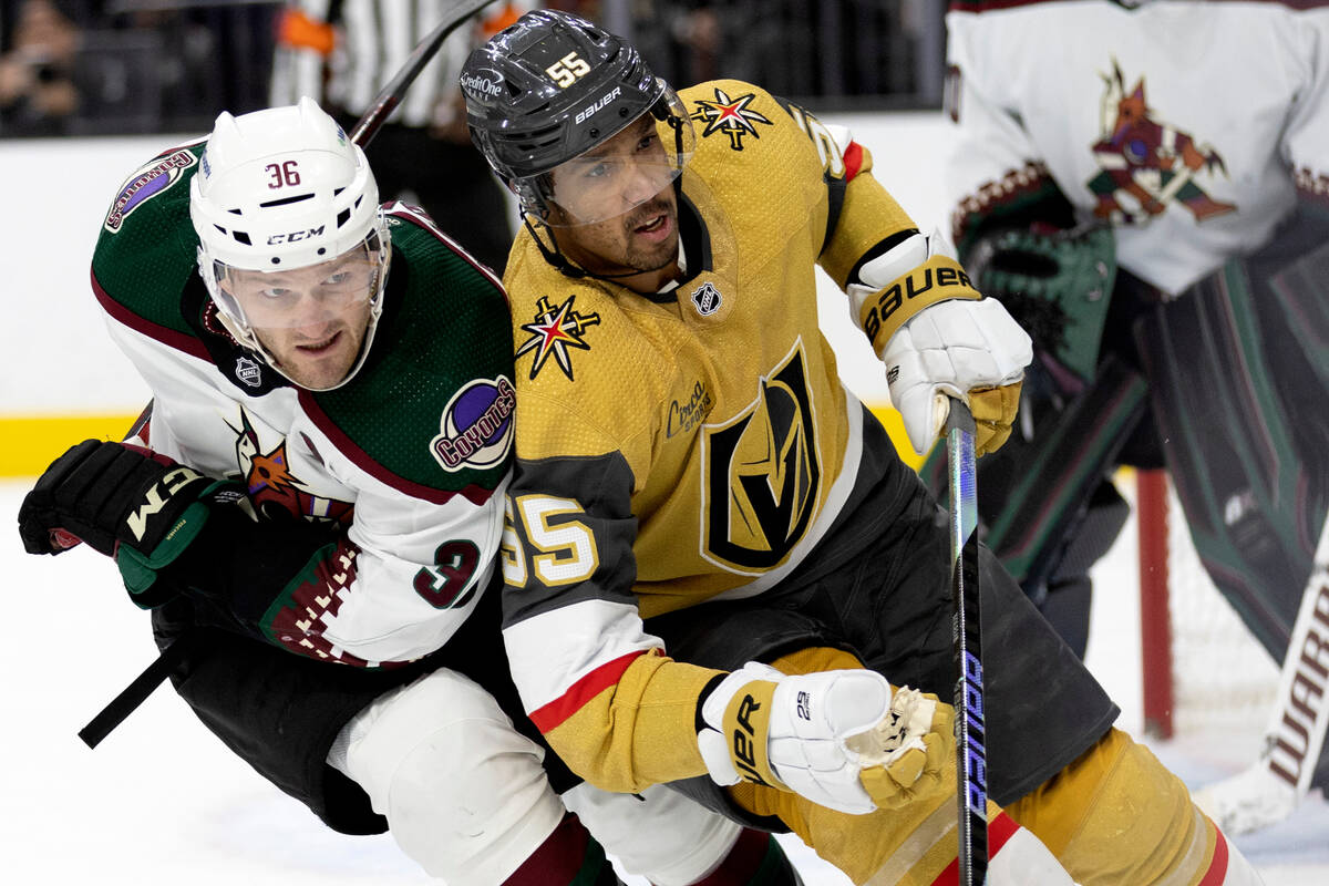 Golden Knights right wing Keegan Kolesar (55) skates against Coyotes right wing Christian Fisch ...