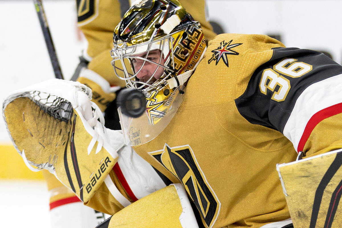 Golden Knights goaltender Logan Thompson (36) saves a shot on goal during the second period of ...