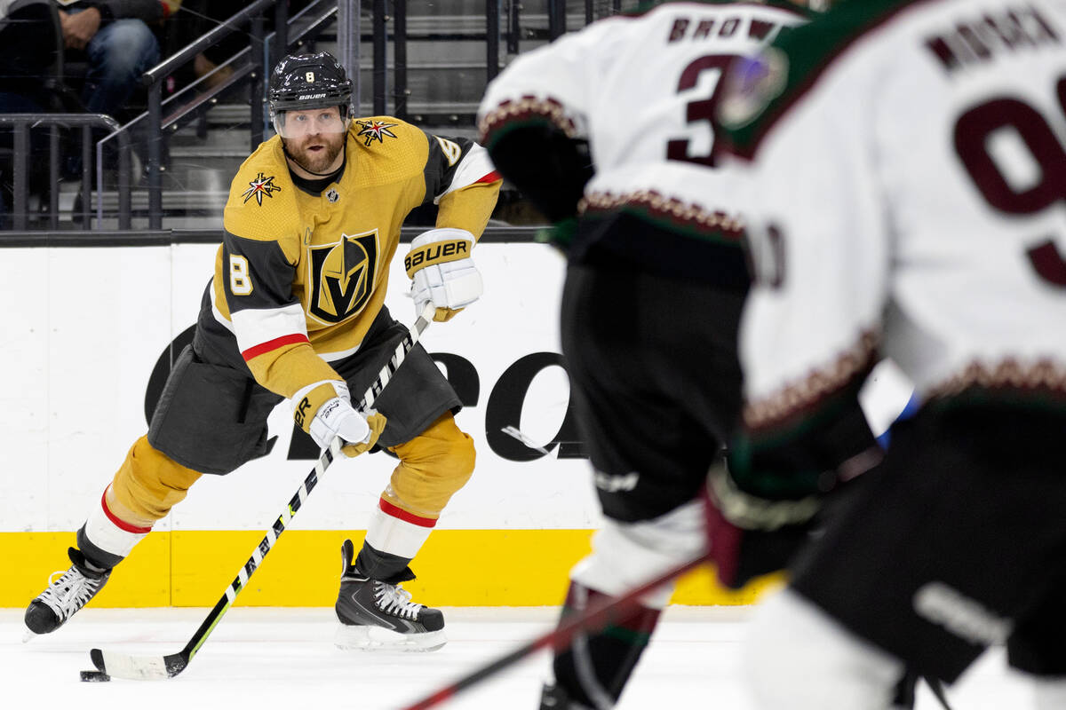 Golden Knights center Phil Kessel (8) looks for an opening in the Coyotes line during the third ...