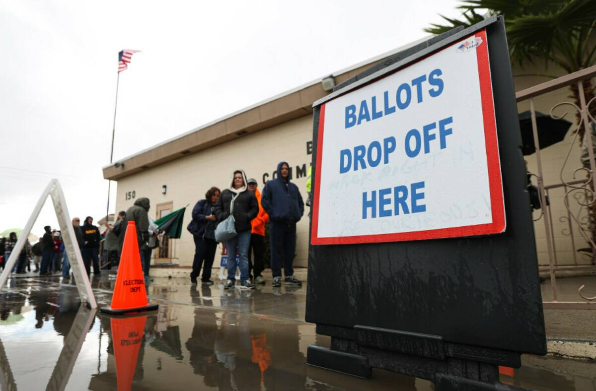 Nye County voters line up to cast their ballots on Election Day at Bob Ruud Community Center in ...