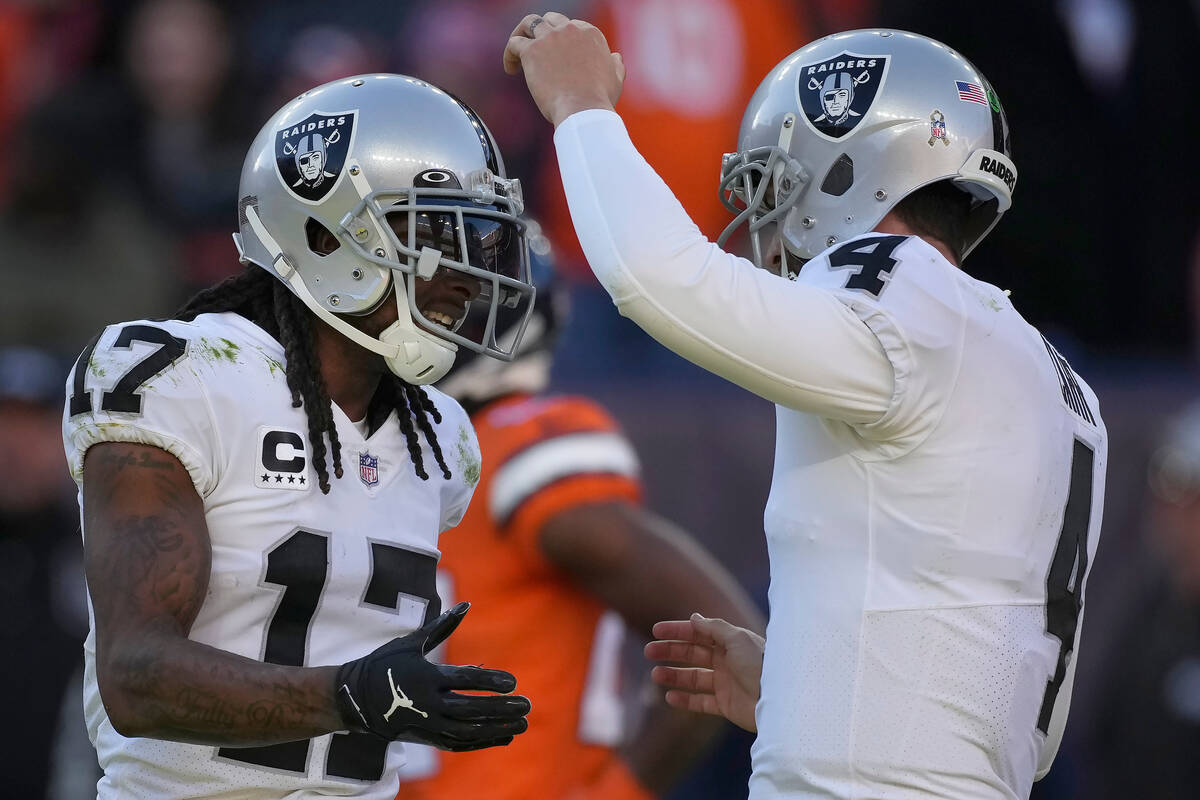 Las Vegas Raiders wide receiver Davante Adams (17) celebrates after scoring on a touchdown pass ...