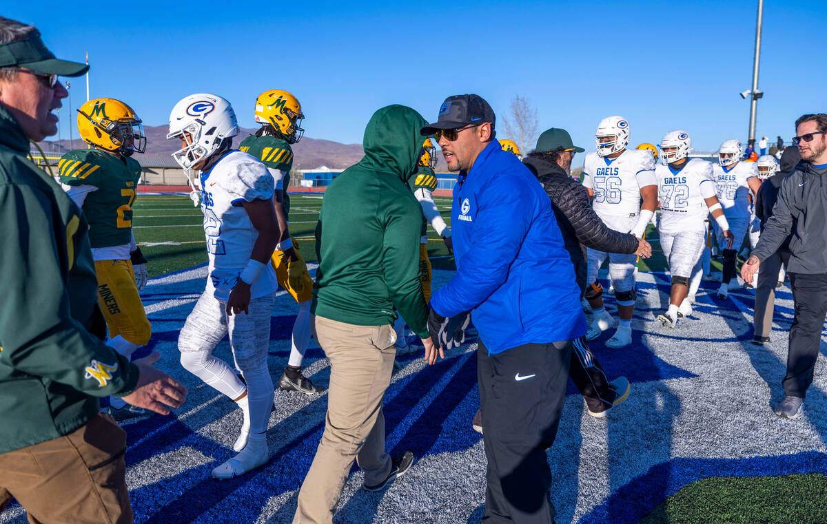 Bishop Gorman head coach Brent Browner thanks Bishop Manogue coaches and players for a good gam ...