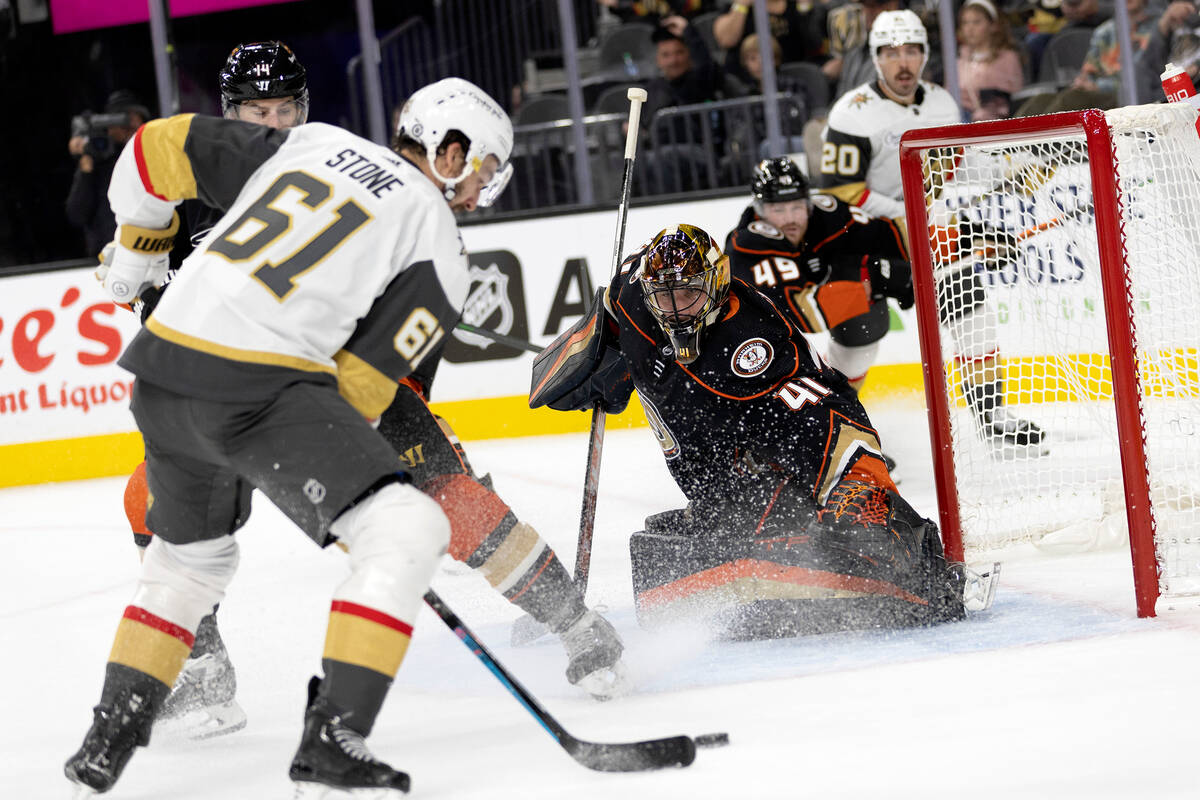 Golden Knights right wing Mark Stone (61) takes a shot on goal while Ducks goaltender Anthony S ...