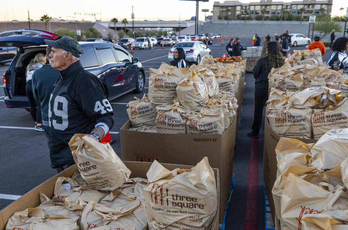 Former Raiders wide receiver Mike Siani (49) eyes the next delivery as he joins Raiders' curren ...