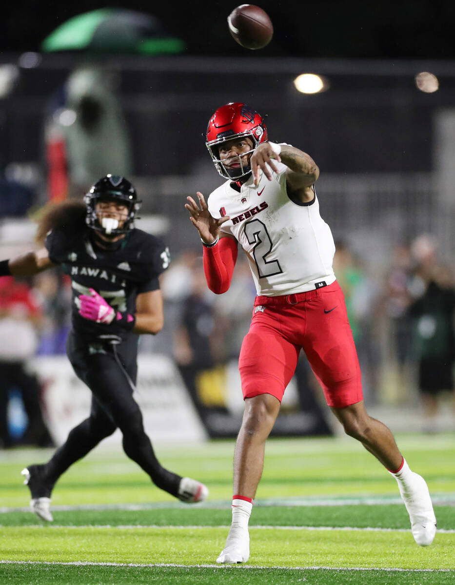 UNLV quarterback Doug Brumfield (2) throws a pass against Hawaii during the first half of an NC ...