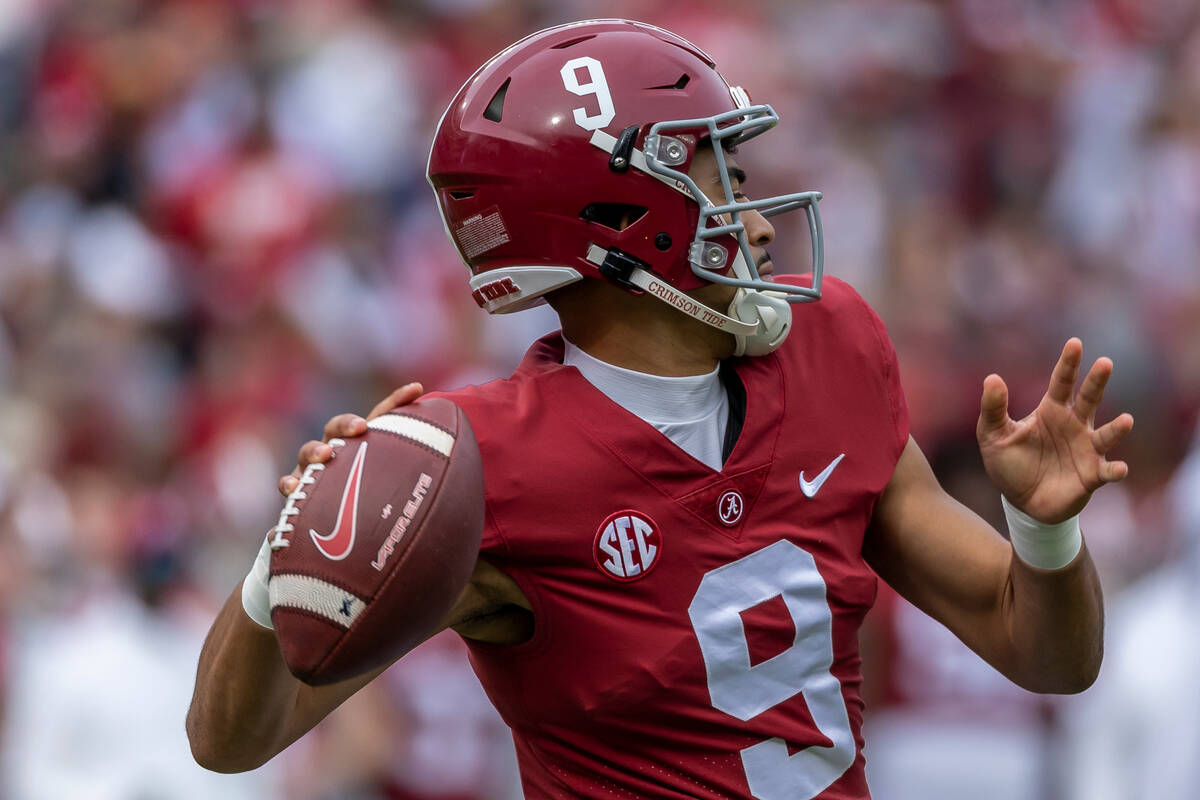 Alabama quarterback Bryce Young (9) throws the ball against Austin Peay during the first half o ...