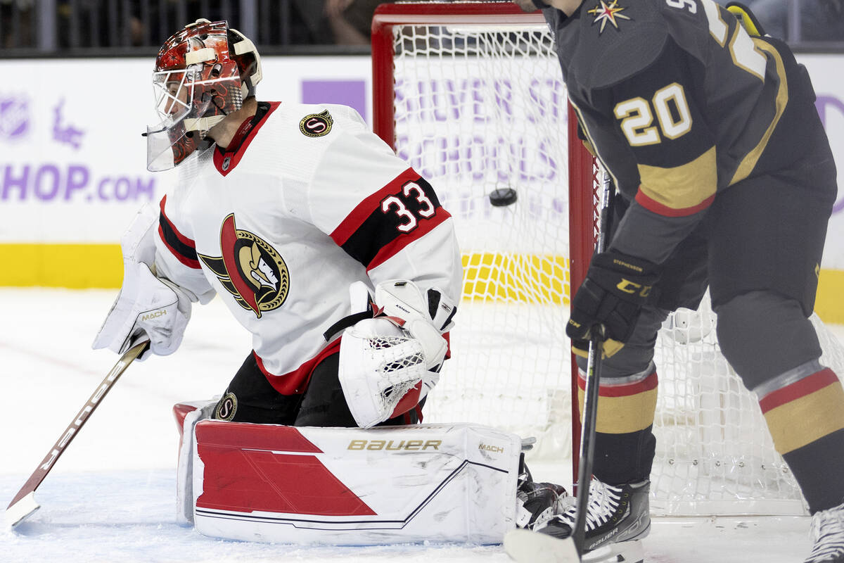 Senators goaltender Cam Talbot (33) misses the save on a shot by Golden Knights right wing Mark ...