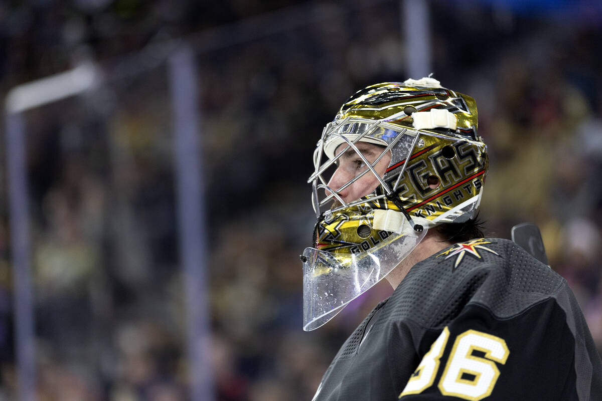 Golden Knights goaltender Logan Thompson (36) skates around the net during the second period of ...