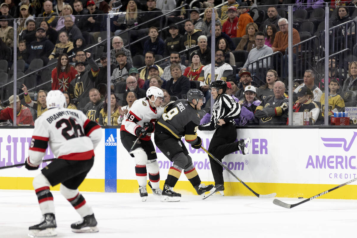 Golden Knights center Jack Eichel (9) skates against Senators right wing Drake Batherson (19) b ...