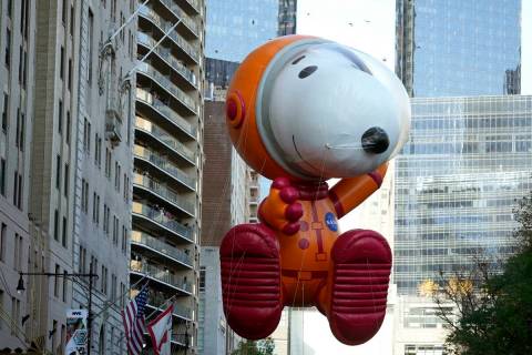 The Astronaut Snoopy balloon floats in the Macy's Thanksgiving Day Parade on Thursday, Nov. 24, ...