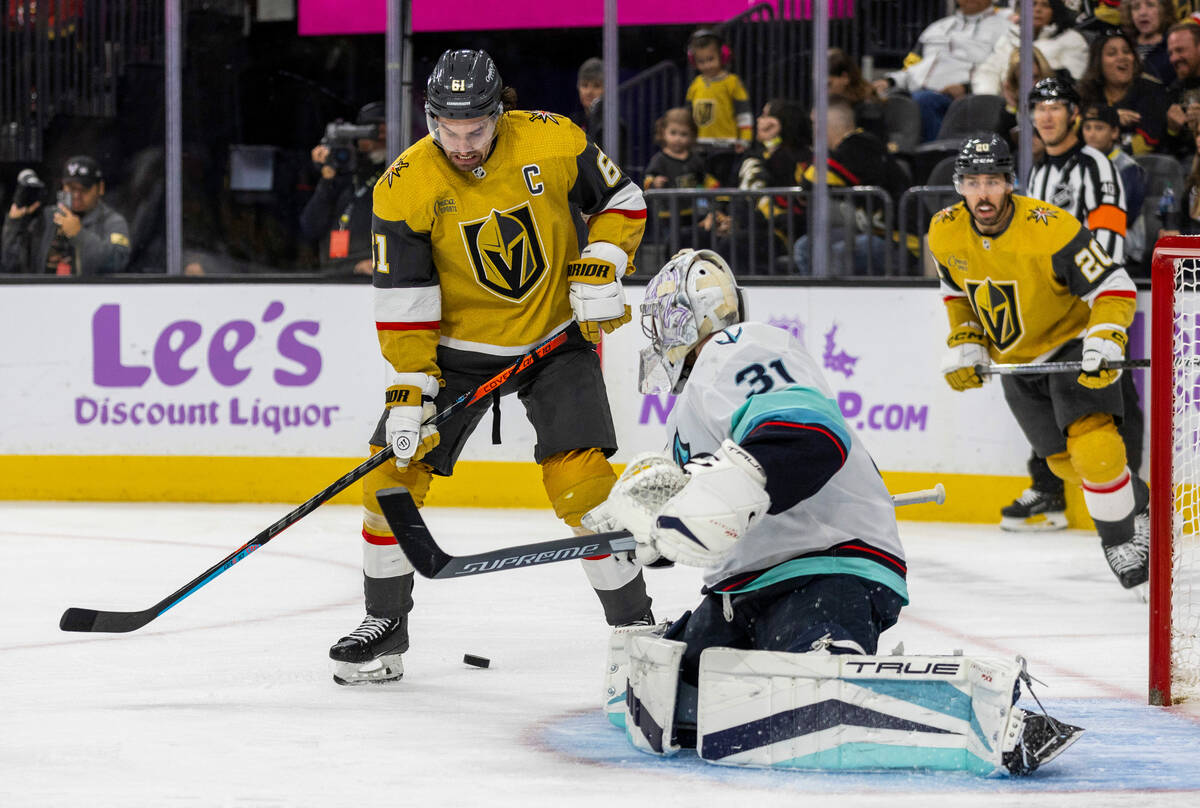 Golden Knights right wing Mark Stone (61) loses control of the puck for a shot as Seattle Krake ...