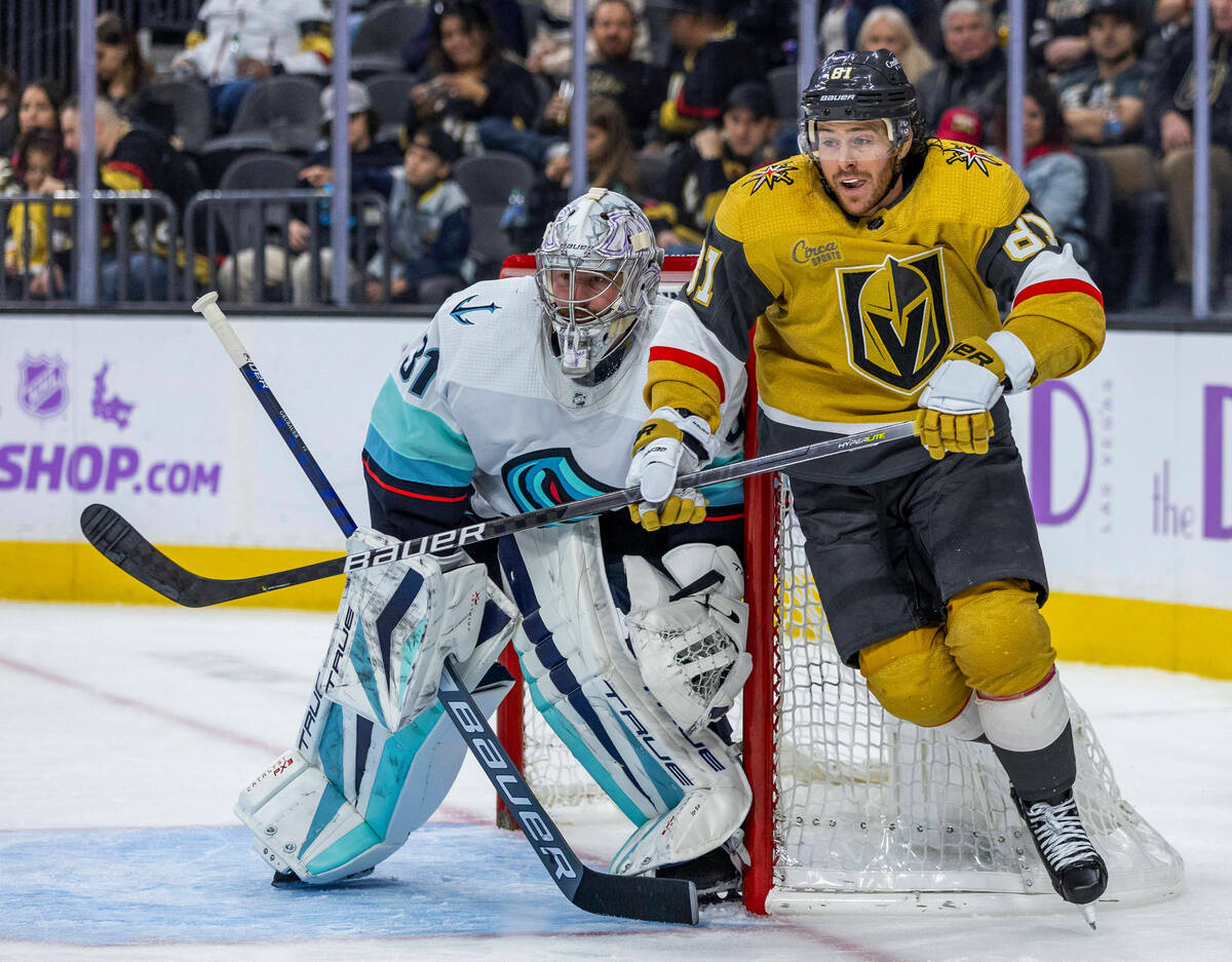 Golden Knights center Jonathan Marchessault (81) reacts to the puck as Seattle Kraken goaltende ...