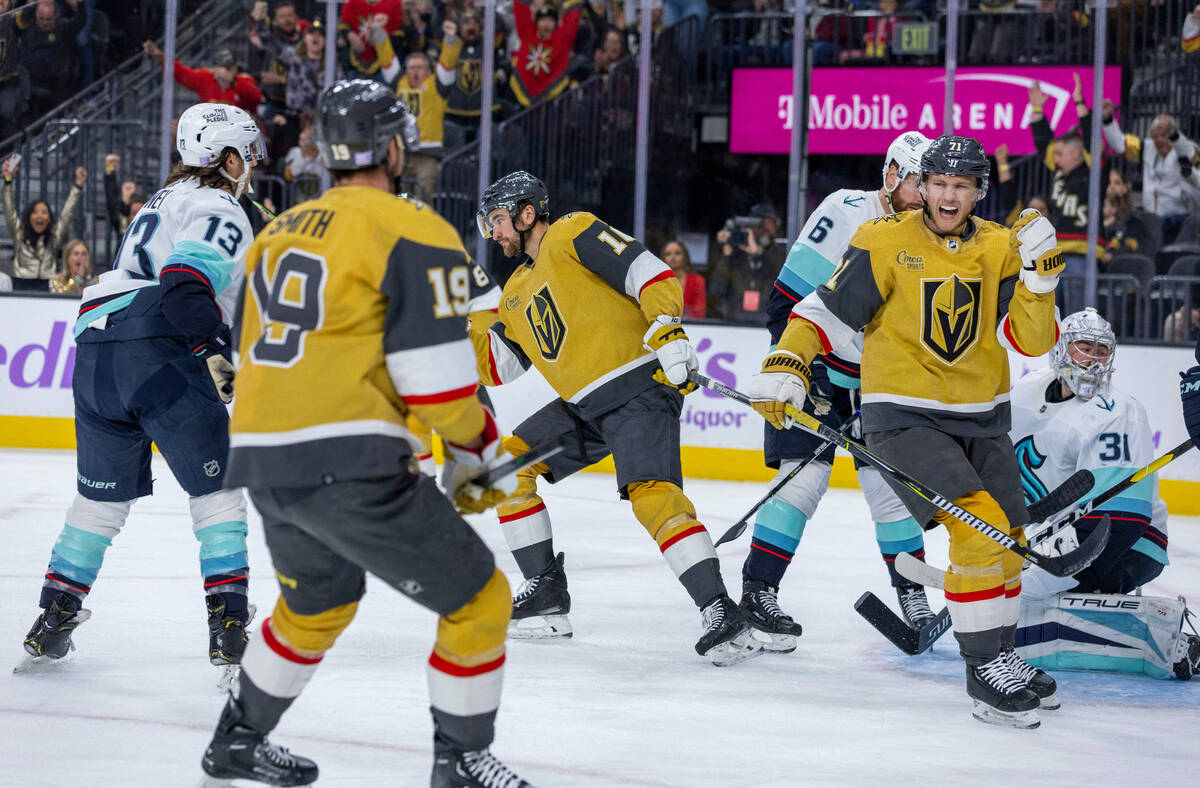 Golden Knights center William Karlsson (71) celebrates a goal with teammates over Seattle Krake ...