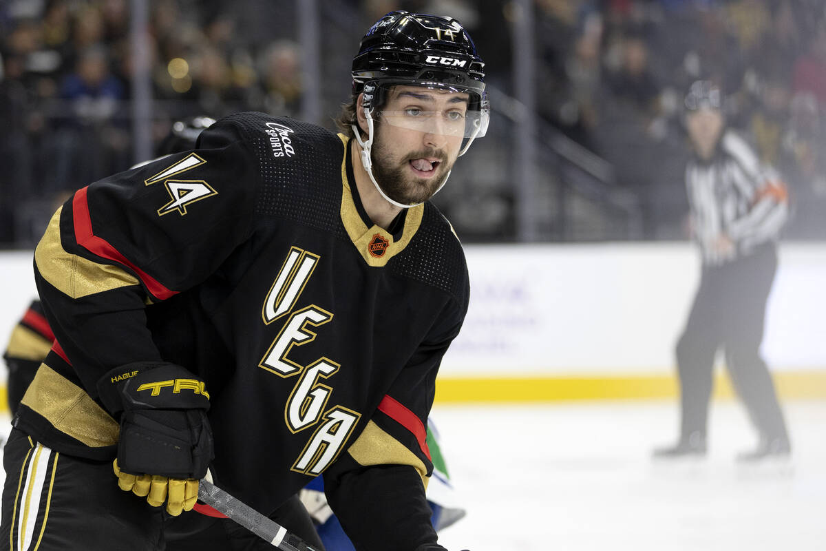 Golden Knights defenseman Nicolas Hague (14) anticipates the puck during the second period of a ...