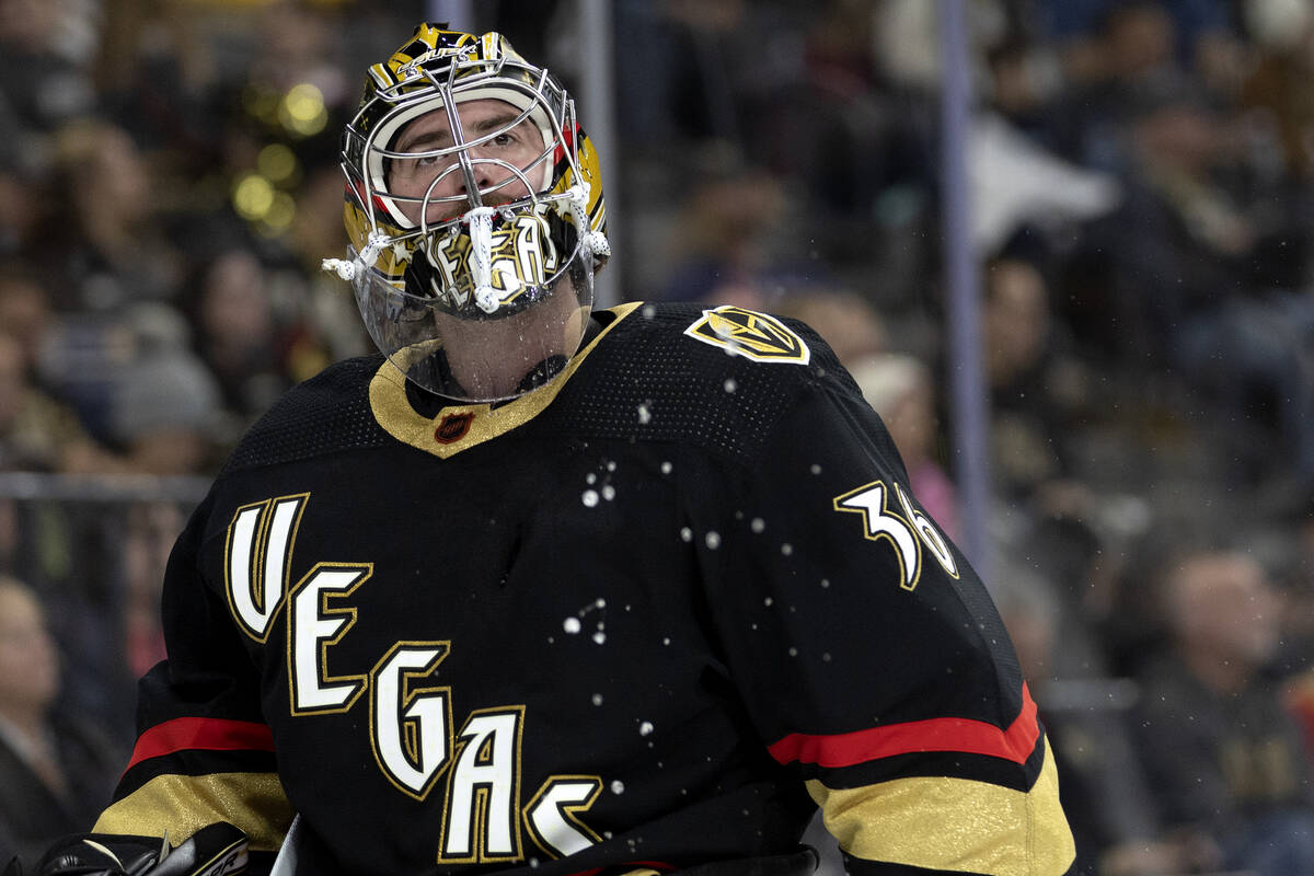 Golden Knights goaltender Logan Thompson (36) skates around the net during the second period of ...