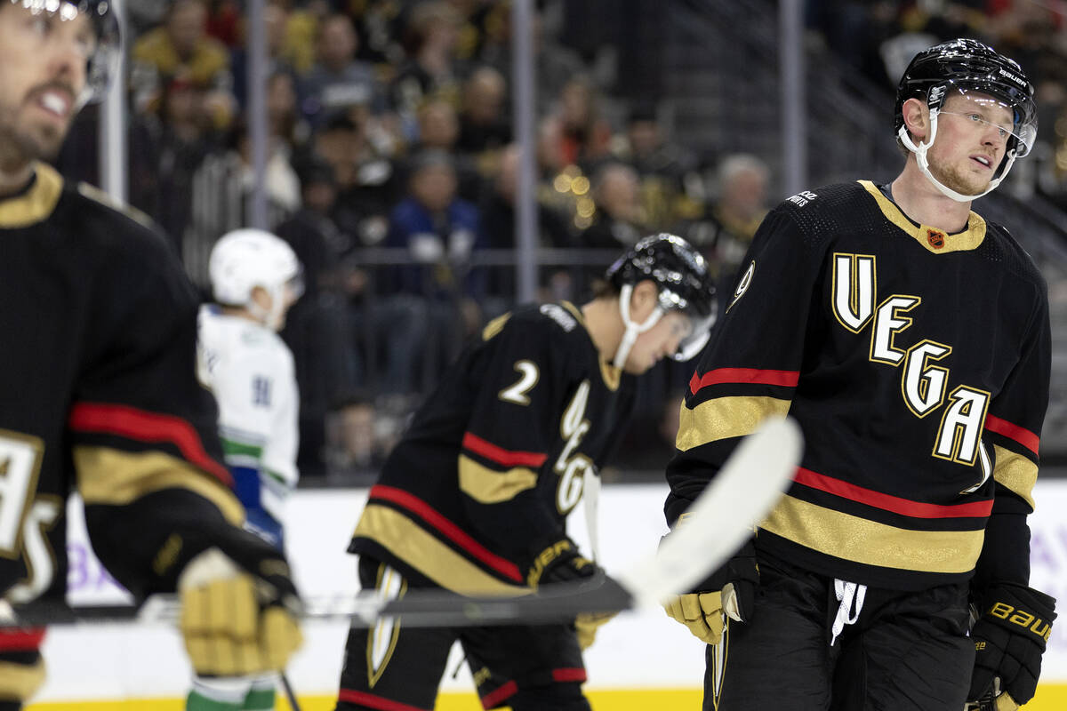 Golden Knights center Chandler Stephenson, left, defenseman Zach Whitecloud (2) and center Jack ...