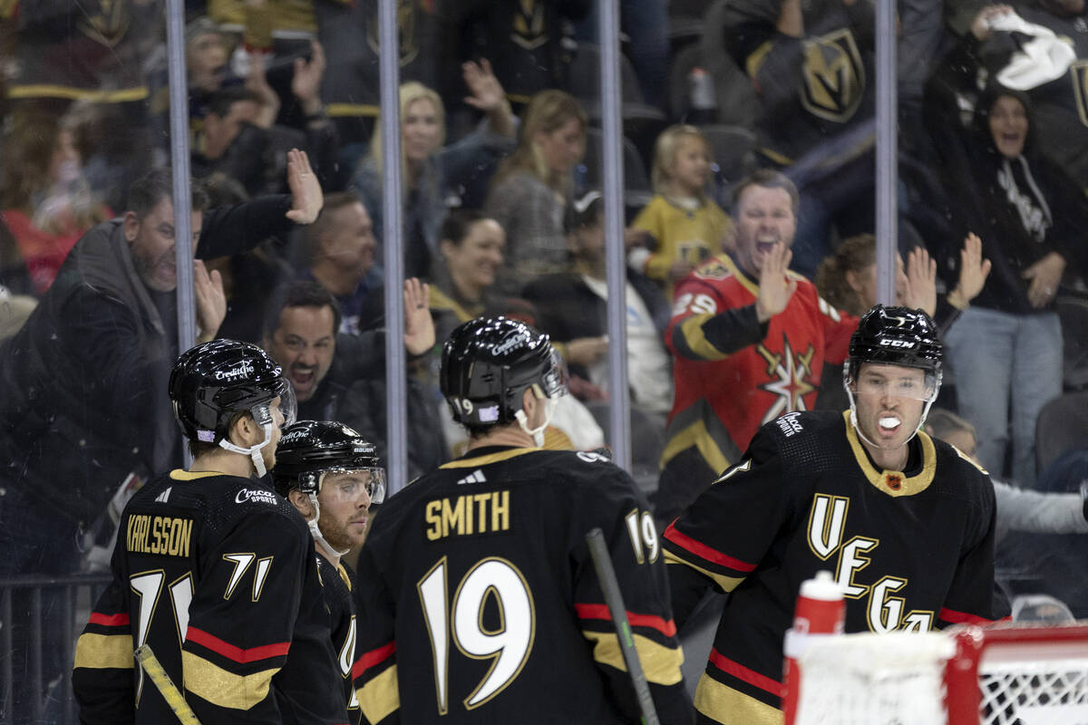 Golden Knights fans go wild for their team after center Jonathan Marchessault (81) scored a goa ...