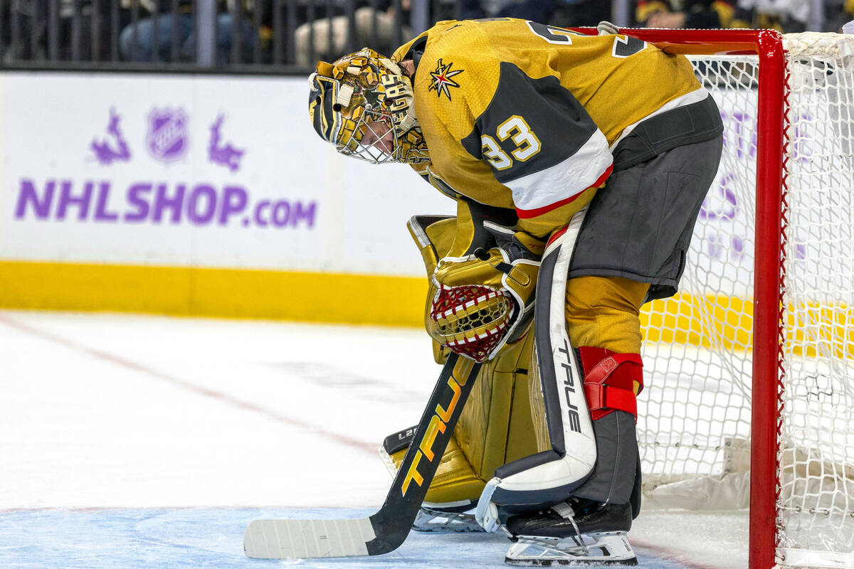 Golden Knights goaltender Adin Hill (33) is dejected after missing another goal score by the Se ...