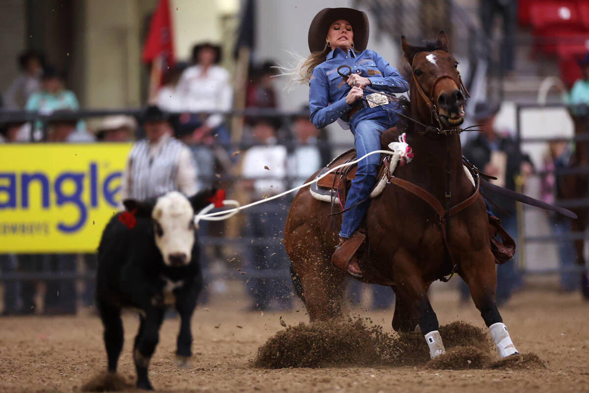 Cadee Williams competes in the women's Wrangler National Finals Breakaway Roping event at the S ...