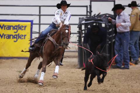 Martha Angelone competes in the women's Wrangler National Finals Breakaway Roping event at the ...