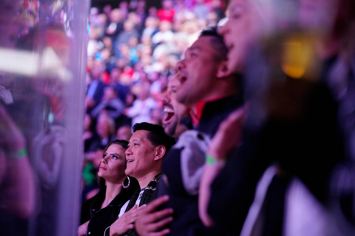 Fans sing the National Anthem before the start of an NHL hockey game against The San Jose Shark ...