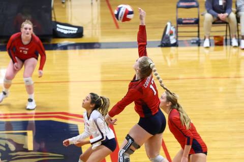 Coronado's Angelina Sayles (17) looks to send the ball over the net against Shadow Ridge during ...