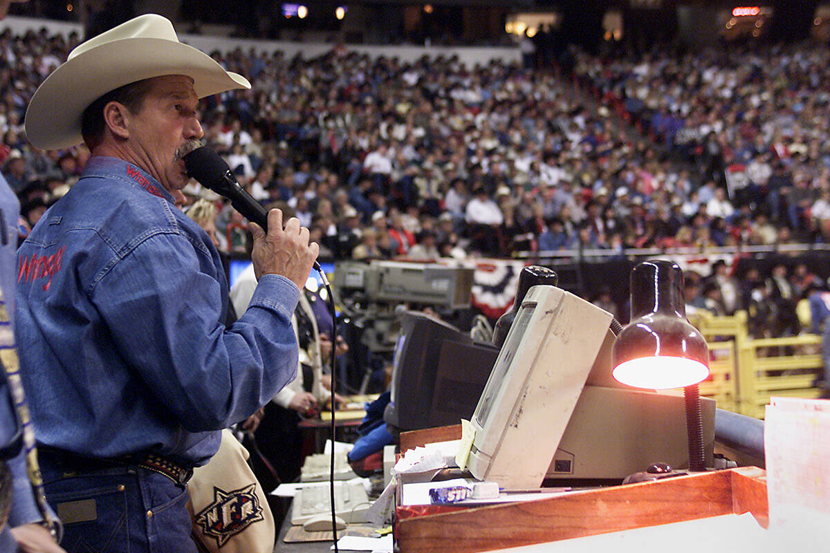 Bob Tallman announces during the fifth go-around of the National Finals Rodeo at the Thomas & M ...