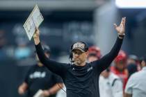 UNLV Rebels head coach Marcus Arroyo signals touchdown over the North Texas Mean Green during t ...