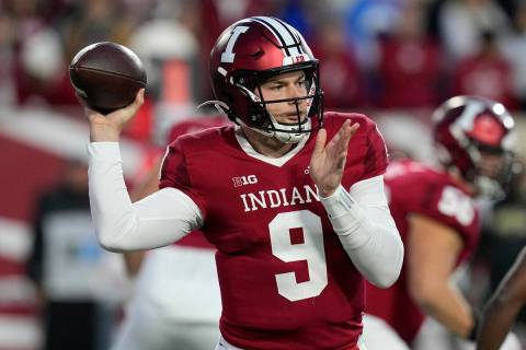 Indiana quarterback Connor Bazelak looks to throw during the second half of an NCAA college foo ...
