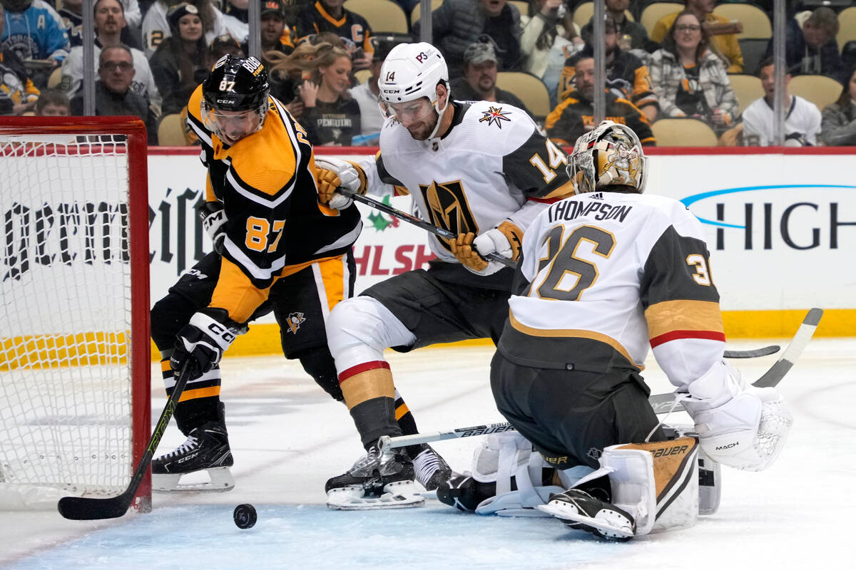 Vegas Golden Knights' Jack Eichel (9) returns to the bench after scoring during the first perio ...