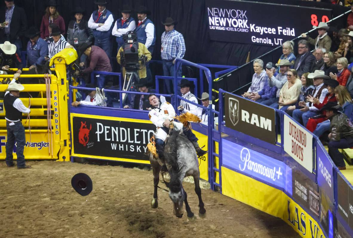 Kaycee Feild, of Genola, Utah, competes in bareback riding during the first night of the Nation ...