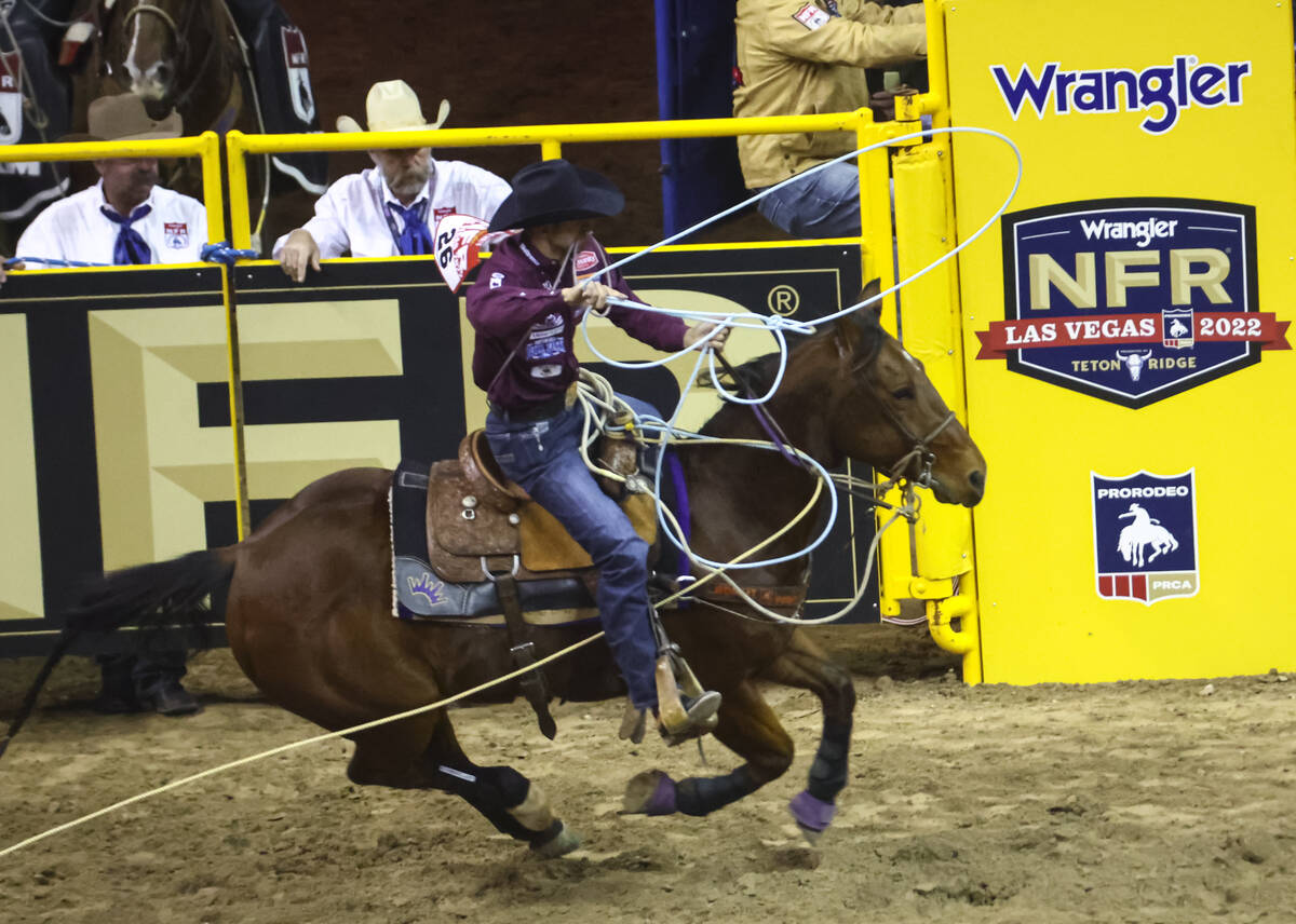 Shane Hanchey, of Sulphur, La., competes in tie-down roping during the first night of the Natio ...