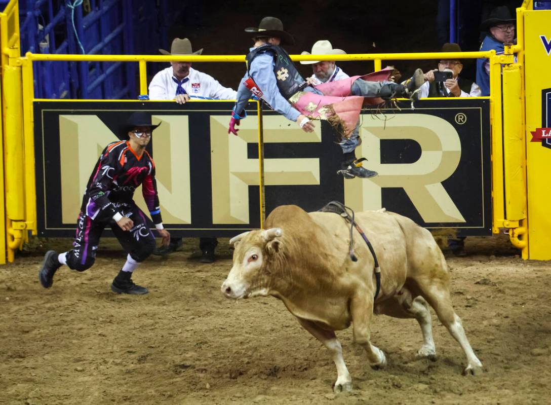 JR Stratford, of Byers, Kan., gets bucked off of Pendleton Punchline while competing in bull ri ...