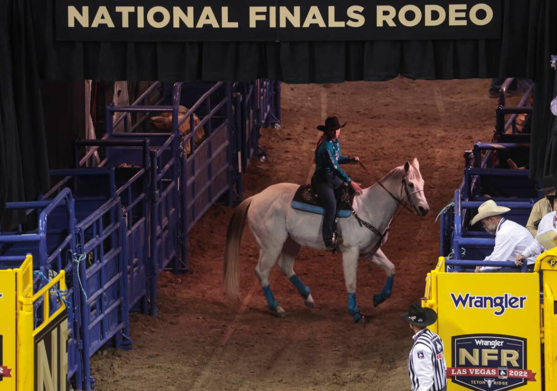 Emily Beisel, of Weatherford, Okla., prepares to compete in barrel racingcompetes during the fi ...