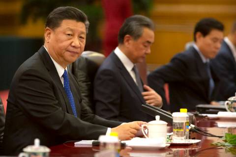 FILE - In this July 2, 2019, file photo, Chinese President Xi Jinping sits during a meeting at ...
