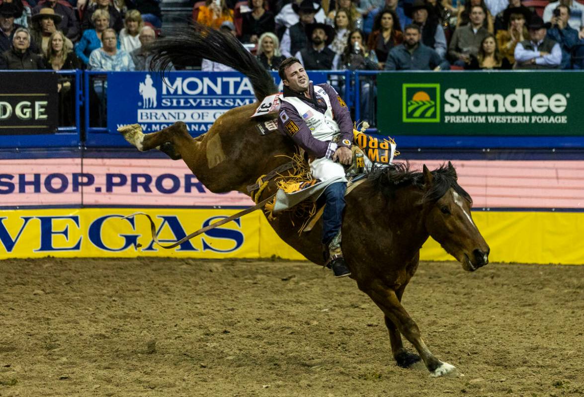 Bareback rider Kaycee Feild of Genola, Utah, rides Sunday Sinner during the National Finals Rod ...