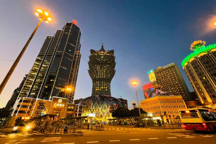 Grand Lisboa, center, is closed in Macao, Monday, July 11, 2022. (AP Photo/Kong)