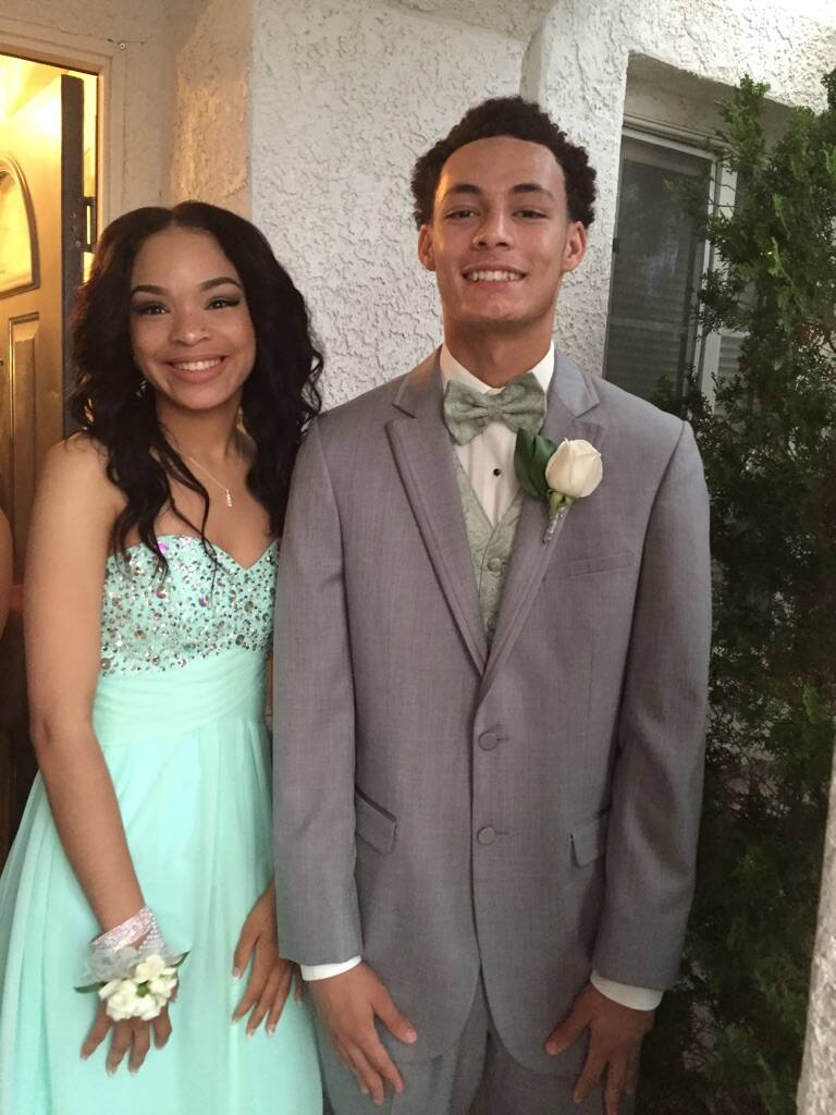Gianni Corsentino, right, with Joy Aguierre, his date for the Liberty High School senior prom, ...