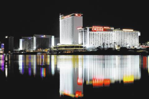 Don Laughlin's Riverside Resort Hotel & Casino casts its reflection on the Colorado River in La ...