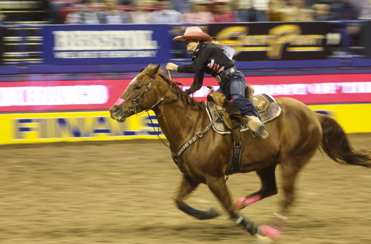 Stevi Hillman, of Granbury, Texas, competes in barrel racing during the fifth go-round of the N ...