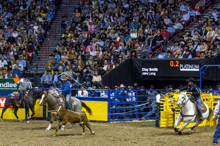 Heeler Jake Long of Coffeyville, Kan., and Header Clay Smith of Broken Bow, OK., complete a win ...