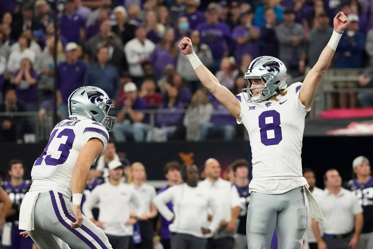 Kansas State's Ty Zentner (8) and Jack Blumer (43) celebrates Zentner's field goal in overtime ...