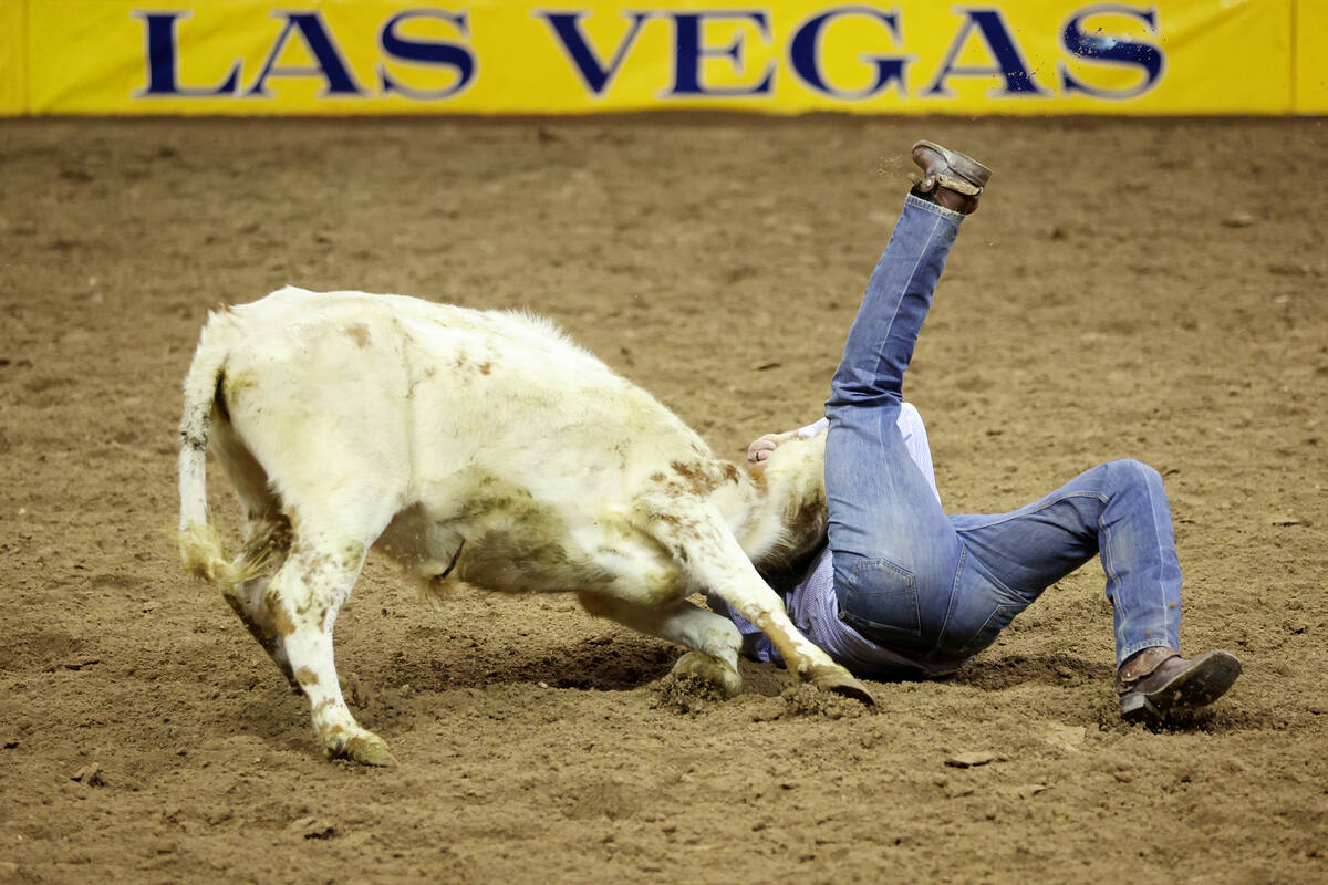 Hunter Cure competes during the steer wrestling event in the 64th Wrangler National Finals Rode ...