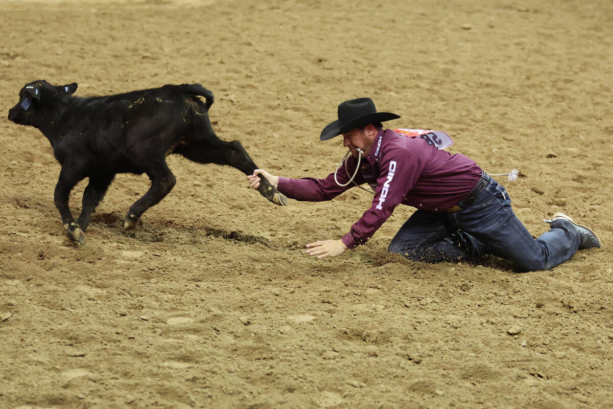 Hunter Herrin competes in the tie-down roping event during the 64th Wrangler National Finals Ro ...