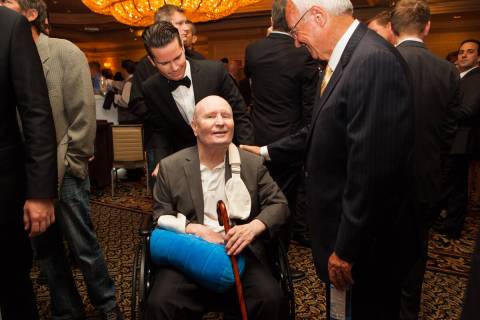 Former boxing official and Hall of Fame inductee Mills Lane, center, is seen during the inaugur ...