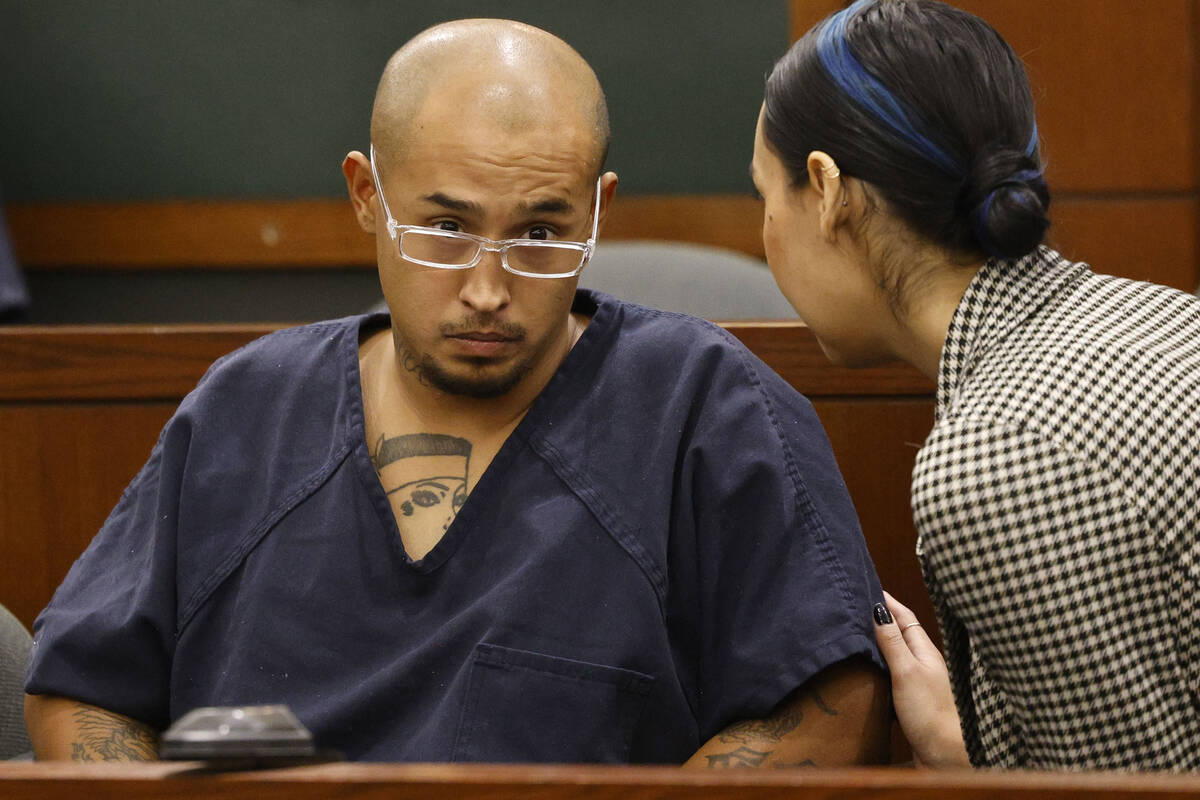 Victor Villanueva listens to his attorney, Paloma Guerrero, during his court hearing on Tuesday ...