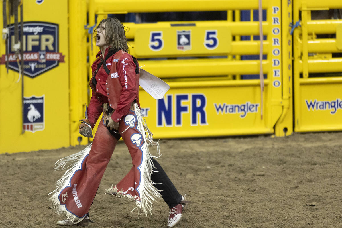 Rocker Steiner, of Weatherford, Tex., celebrates after competing in bareback riding during the ...