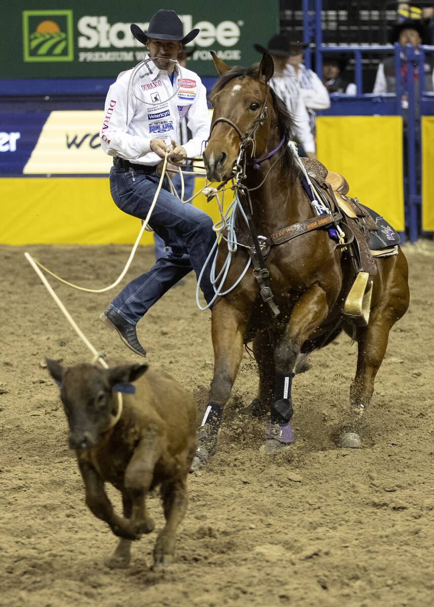 Shane Hanchey, of Sulphur, La., competes in tie-down roping during the sixth go-round of the Na ...
